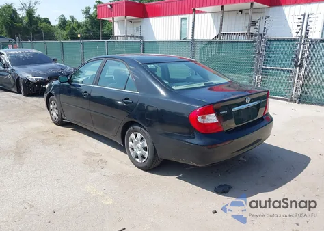 2003 Toyota Camry Le z USA, uszkodzony, nr VIN JTDBE32K730235638